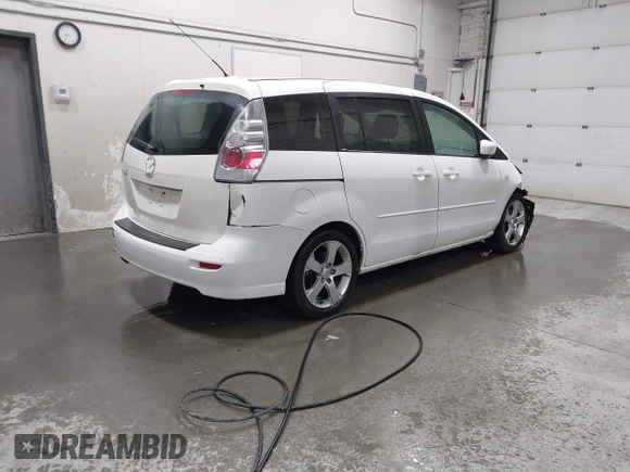 2006 Mazda 5 Sport with VIN JM1CR293360130391, listed as a IAAI auction lot 41614798 with 140,676 mi miles and . Bid and sale history available at DreamBid. Image 4.