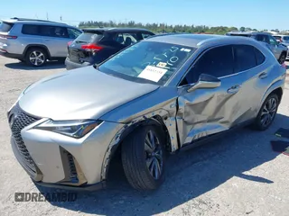 2022 Lexus UX 200 F Sport with VIN JTHE3JBH3N2056014, listed as a IAAI auction lot 41832434 with 25,693 mi miles and . Bid and sale history available at DreamBid. Image 2.