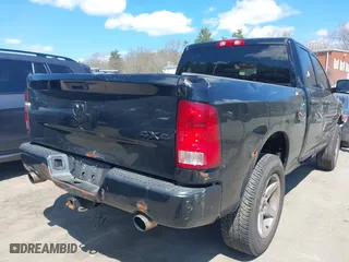 2014 Ram 1500 Express with VIN 1C6RR7FTXES143452, listed as a IAAI auction lot 42050917 with 310,525 mi miles. Bid and sale history available at carsss.com. Image 4.