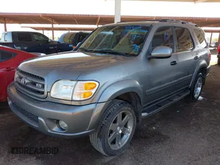 2003 Toyota Sequoia SR5 with VIN 5TDZT34A13S149313, listed as a IAAI auction lot 41841538 with 210,440 mi miles. Bid and sale history available at carsss.com. Image 2.