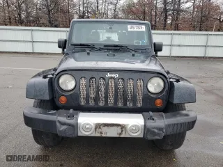 2012 Jeep Wrangler Unlimited Sahara with VIN 1C4HJWEG0CL163310, listed as a Copart auction lot 48972825 with 125,934 mi miles and Salvage Title. Bid and sale history available at carsss.com. Image 5.