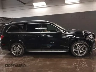 2018 Mercedes-Benz GLS 550 with VIN 4JGDF7DE1JB070994, listed as a IAAI auction lot 41676076 with 104,748 mi miles and . Bid and sale history available at DreamBid. Image 13.