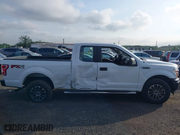 2018 Ford F-150 XL with VIN 1FTEX1EB0JFB32577, listed as a IAAI auction lot 42704857 with 147,359 mi miles and . Bid and sale history available at DreamBid. Image 13.