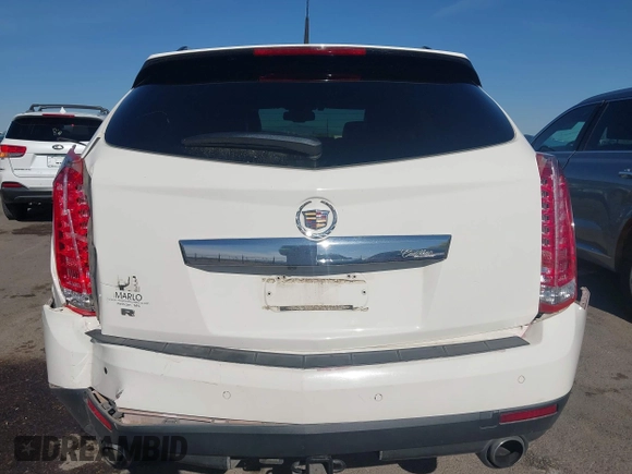 2012 Cadillac SRX Luxury Collection z VIN 3GYFNAE32CS518428, wystawiony jako IAAI lot #42153391 z przebiegiem 159 836 mil mil oraz . Historia ofert i sprzedaży dostępna na DreamBid. Obrazek 17.