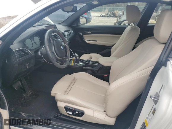 2018 BMW 2 Series 230i xDrive with VIN WBA2J3C52JVD48952, listed as a Copart auction lot 46394065 with 77,274 mi miles and Salvage title. Bid and sale history available at DreamBid. Image 7.
