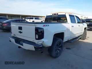 2016 Chevrolet Silverado 1500 LTZ with VIN 3GCUKSEJ0GG221628, listed as a IAAI auction lot 41276045 with 153,476 mi miles. Bid and sale history available at carsss.com. Image 4.