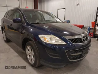 2012 Mazda CX-9 Touring z VIN JM3TB3CV1C0357778, wystawiony jako IAAI lot #42298070 z przebiegiem 148 581 mil mil oraz . Historia ofert i sprzedaży dostępna na DreamBid. Obrazek 1.