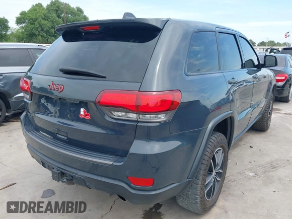 2017 Jeep Grand Cherokee Trailhawk with VIN 1C4RJFLG4HC843628, listed as a IAAI auction lot 42053878 with 83,551 mi miles and . Bid and sale history available at DreamBid. Image 4.