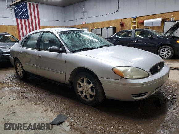 2004 Ford Taurus SE with VIN 1FAFP53224G175353, listed as a Copart auction lot 52713935 with 213,375 mi miles and Salvage Title. Bid and sale history available at DreamBid. Image 4.