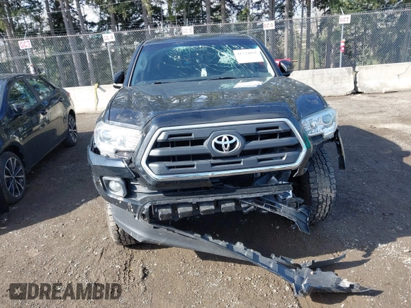 2017 Toyota Tacoma SR5 with VIN 5TFAZ5CN3HX040199, listed as a IAAI auction lot 41734051 with 107,665 mi miles and . Bid and sale history available at carsss.com. Image 11.