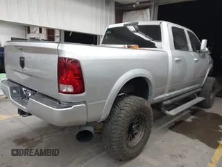 2014 Ram 2500 Tradesman with VIN 3C6UR5CL7EG254020, listed as a IAAI auction lot 41805542 with 141,694 mi miles and . Bid and sale history available at DreamBid. Image 4.