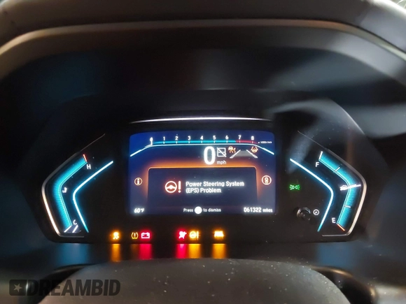2021 Honda Odyssey Touring with VIN 5FNRL6H83MB040138, listed as a IAAI auction lot 39150096 with 61,322 mi miles and . Bid and sale history available at DreamBid. Image 7.