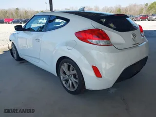 2016 Hyundai Veloster with VIN KMHTC6AD5GU268842, listed as a IAAI auction lot 41672376 with 156,703 mi miles. Bid and sale history available at carsss.com. Image 3.