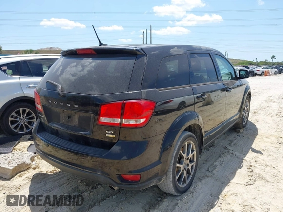 2018 Dodge Journey GT z VIN 3C4PDCEG9JT379885, wystawiony jako IAAI lot #42021907 z przebiegiem 137 359 mil mil oraz . Historia ofert i sprzedaży dostępna na DreamBid. Obrazek 4.
