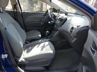2014 Chevrolet Sonic LT with VIN 1G1JC6SG7E4118564, listed as a IAAI auction lot 41827748 with 120,326 mi miles. Bid and sale history available at carsss.com. Image 5.