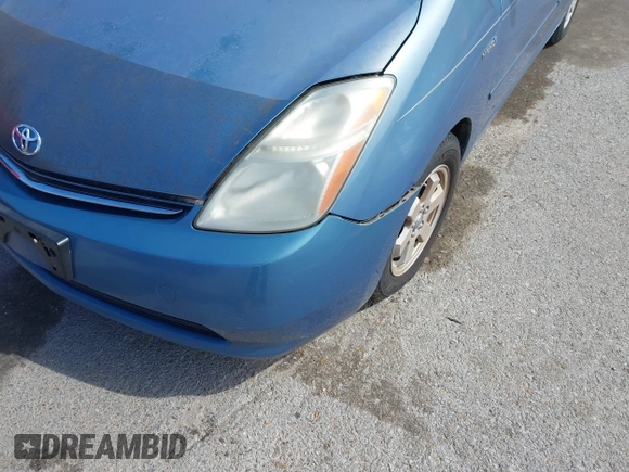 2007 Toyota Prius z VIN JTDKB20U677595987, wystawiony jako IAAI lot #41876974 z przebiegiem 218 650 mil mil oraz . Historia ofert i sprzedaży dostępna na DreamBid. Obrazek 6.