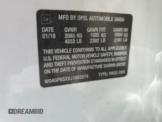 2018 Buick Regal Essence with VIN W04GP6SXXJ1093574, listed as a Copart auction lot 62387425 with 27,879 mi miles and Salvage title. Bid and sale history available at DreamBid. Image 13.