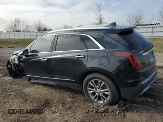 2021 Cadillac XT5 FWD Premium Luxury with VIN 1GYKNCRS1MZ107036, listed as a Copart auction lot 45534075 with 66,813 mi miles and Salvage Title. Bid and sale history available at carsss.com. Image 2.