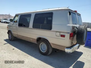 1994 GMC Vandura z VIN 1GDEG25K4RF512695, wystawiony jako Copart lot #63562414 z przebiegiem 171 855 mil mil oraz Szkody całkowita. Historia ofert i sprzedaży dostępna na DreamBid. Obrazek 2.