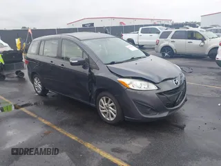 2015 Mazda 5 Sport with VIN JM1CW2BL3F0188052, listed as a IAAI auction lot 40777036 with 69,405 mi miles. Bid and sale history available at carsss.com. Image 1.