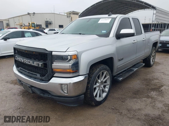2018 Chevrolet Silverado 1500 LT with VIN 1GCRCREC4JZ287085, listed as a IAAI auction lot 41450057 with 79,275 mi miles and . Bid and sale history available at DreamBid. Image 2.
