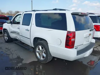 2010 Chevrolet Suburban LTZ with VIN 1GNUKKE34AR189475, listed as a IAAI auction lot 41179252 with 127,132 mi miles. Bid and sale history available at carsss.com. Image 3.