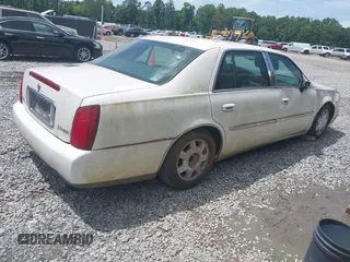 2004 Cadillac DeVille z VIN 1G6KD54Y84U206890, wystawiony jako IAAI lot #42373887 z przebiegiem 160 527 mil mil oraz . Historia ofert i sprzedaży dostępna na DreamBid. Obrazek 4.