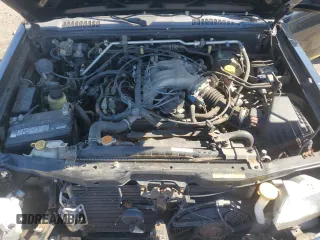 2000 Nissan Frontier XE z VIN 1N6ED26T3YC411827, wystawiony jako Copart lot #48612455 z przebiegiem 140 373 mil mil oraz Czysty tytuł • Clean title. Historia ofert i sprzedaży dostępna na DreamBid. Obrazek 11.