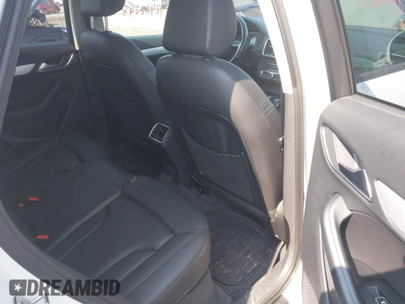 2017 Audi Q3 Premium z VIN WA1ECCFS7HR009402, wystawiony jako IAAI lot #42462248 z przebiegiem 46 536 mil mil oraz . Historia ofert i sprzedaży dostępna na DreamBid. Obrazek 8.