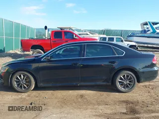 2015 Volkswagen Passat 1.8T Limited Edition with VIN 1VWAT7A37FC075800, listed as a IAAI auction lot 41856654 with 130,139 mi miles. Bid and sale history available at carsss.com. Image 14.