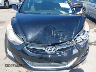 2013 Hyundai Elantra Limited with VIN KMHDH4AE9DU664514, listed as a IAAI auction lot 42031666 with 90,517 mi miles and . Bid and sale history available at DreamBid. Image 6.