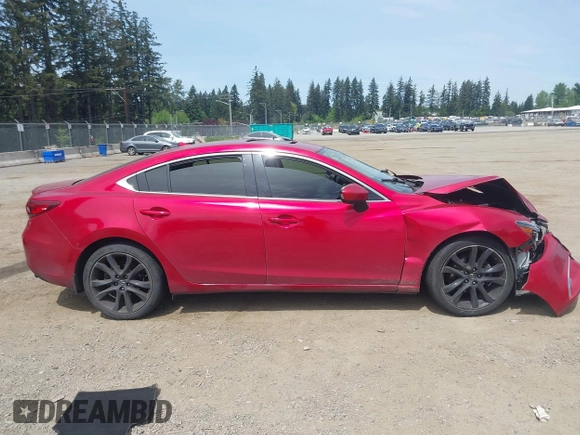 2016 Mazda 6 i Grand Touring с VIN JM1GJ1W52G1403034, выставлен на аукционе IAAI как лот 42238556 с пробегом 141 470 миль миль и . История ставок и продаж доступна на DreamBid. Изображение 13.