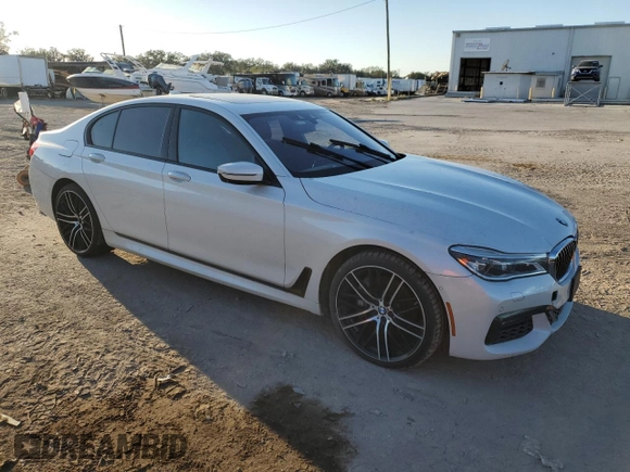 2016 BMW 7 Series 750i xDrive with VIN WBA7B0C59GG526741, listed as a Copart auction lot 86312384 with 90,360 mi miles and Salvage title. Bid and sale history available at DreamBid. Image 4.