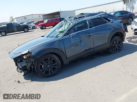 2024 Mazda CX-30 S Preferred z VIN 3MVDMBCMXRM640631, wystawiony jako IAAI lot #41900958 z przebiegiem 10 332 mil mil oraz . Historia ofert i sprzedaży dostępna na DreamBid. Obrazek 2.
