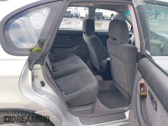 2002 Subaru Legacy with VIN 4S3BE645527201843, listed as a IAAI auction lot 42751980 with 211,060 mi miles and . Bid and sale history available at DreamBid. Image 8.
