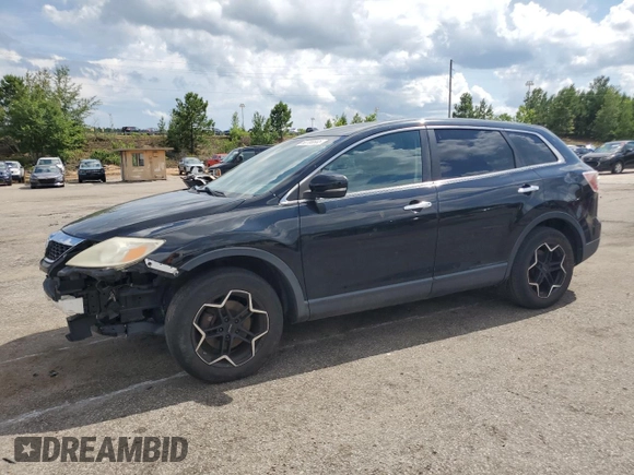 2012 Mazda CX-9 Grand Touring z VIN JM3TB2DAXC0358272, wystawiony jako Copart lot #60703665 z przebiegiem 278 558 mil mil oraz Szkoda całkowita • Salvage title. Historia ofert i sprzedaży dostępna na DreamBid. Obrazek 1.