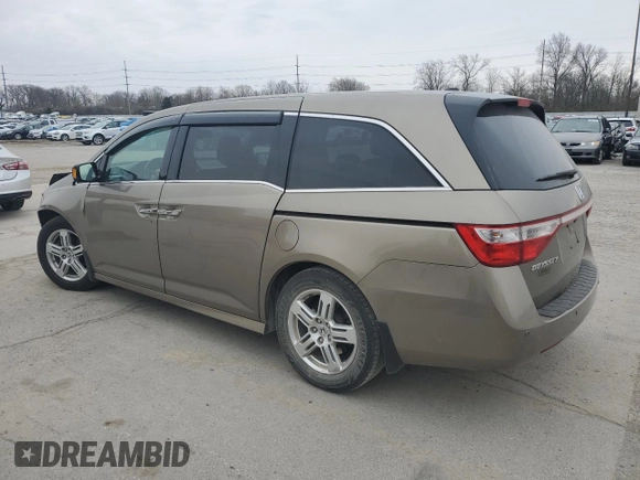 2012 Honda Odyssey Touring with VIN 5FNRL5H9XCB078399, listed as a Copart auction lot 52360165 with 174,819 mi miles and Salvage Title. Bid and sale history available at DreamBid. Image 2.