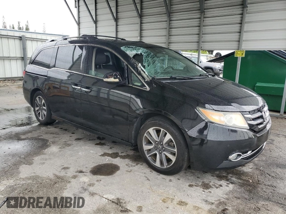 2015 Honda Odyssey Touring Elite с VIN 5FNRL5H91FB107793, выставлен на аукционе Copart как лот 59295355 с пробегом 91 910 миль миль и Списание • Salvage title. История ставок и продаж доступна на DreamBid. Изображение 4.