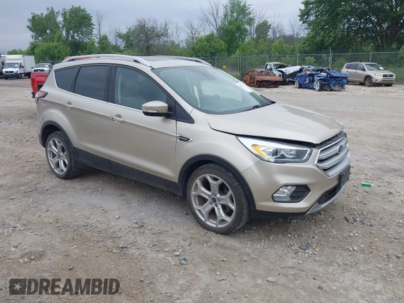 2018 Ford Escape Titanium with VIN 1FMCU9J94JUA44964, listed as a IAAI auction lot 42494471 with 100,955 mi miles and . Bid and sale history available at DreamBid. Image 1.