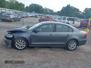 2011 Volkswagen Jetta SE with VIN 3VWDX7AJ5BM388532, listed as a IAAI auction lot 42453112 with 120,170 mi miles and . Bid and sale history available at DreamBid. Image 14.