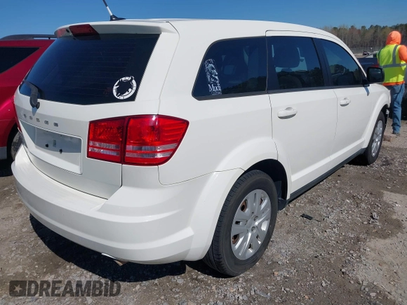 2013 Dodge Journey SE with VIN 3C4PDCAB0DT695464, listed as a IAAI auction lot 41899206 with 311,327 mi miles. Bid and sale history available at carsss.com. Image 4.