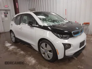 2015 BMW i3 with VIN WBY1Z4C53FV504836, listed as a IAAI auction lot 41155614 with 66,910 mi miles. Bid and sale history available at carsss.com. Image 1.