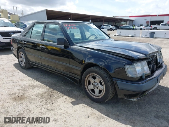 1987 Mercedes-Benz 300 with VIN WDBEA30D8HA397811, listed as a IAAI auction lot 41868336 with 124,720 mi miles. Bid and sale history available at carsss.com. Image 1.