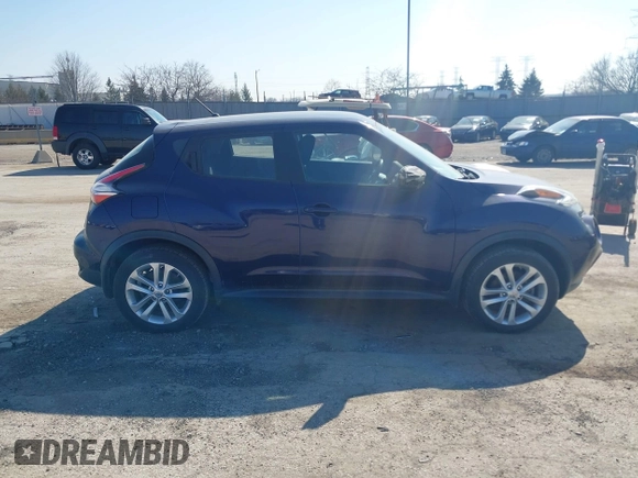 2015 Nissan Juke S with VIN JN8AF5MVXFT561176, listed as a IAAI auction lot 41797063 with 92,235 mi miles and . Bid and sale history available at carsss.com. Image 13.
