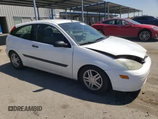 2003 Ford Focus ZX3 с VIN 3FAFP31303R120956, выставлен на аукционе Copart как лот 55867825 с пробегом 169 277 миль миль и Списание • Salvage title. История ставок и продаж доступна на DreamBid. Изображение 4.