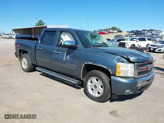 2010 Chevrolet Silverado 1500 LT with VIN 3GCRCSE09AG151287, listed as a IAAI auction lot 40532023 with 154,535 mi miles. Bid and sale history available at carsss.com. Image 1.