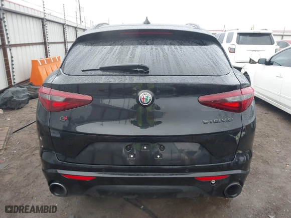 2021 Alfa Romeo Stelvio Ti with VIN ZASPAKBN0M7D02795, listed as a IAAI auction lot 41052309 with 83,584 mi miles. Bid and sale history available at carsss.com. Image 17.