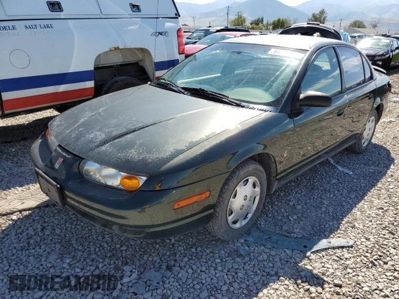 2000 Saturn SL with VIN 1G8ZH5285YZ240565, listed as a Copart auction lot 66567153 with 202,109 mi miles and Salvage title. Bid and sale history available at DreamBid. Image 1.