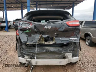 2016 Jeep Cherokee Latitude z VIN 1C4PJLCB6GW171384, wystawiony jako Copart lot #55820145 z przebiegiem 127 062 mil mil oraz Szkoda całkowita • Salvage title. Historia ofert i sprzedaży dostępna na DreamBid. Obrazek 6.
