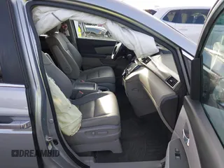 2017 Honda Odyssey EX-L with VIN 5FNRL5H64HB017661, listed as a IAAI auction lot 41719447 with 99,895 mi miles and . Bid and sale history available at DreamBid. Image 5.